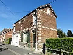 Habitations groupées par deux.