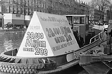 Publicité embarquée sur un bateau pour  Vingt Mille Lieues sous les mers (1954), rediffusé en 1967.