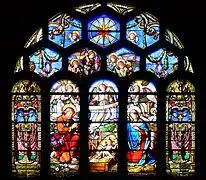 Verrière du transept sud : La Nativité (XIXe siècle).