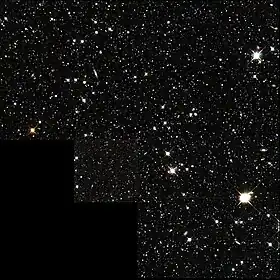 Partie centrale de la galaxie naine du Dragon vue par le télescope spatial Hubble.