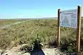 Un panneau d'information de la réserve naturelle de Camargue lors d'une vélo-randonnée sur la digue à la mer (2014) ;