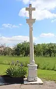 Croix de carrefour datée de 1619 située à l'est du village.