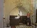 Chœur, arcade vers la chapelle orientée nord.