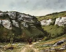 Voyageur suivi de son âne chargé, dans une vallée de montagne, signé « G. Courbet ».