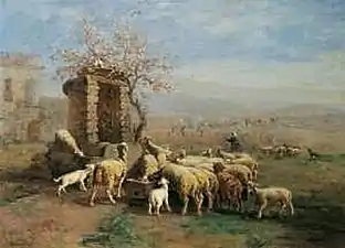 Moutons autour d'un abreuvoir.