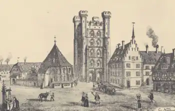 Dessin d'une place fréquentée par plusieurs personnes, un bœuf, des chevaux et une charrette entourés de maisons avec, au centre, une tour en pierre surmontée de quatre tourelles avec des créneaux.