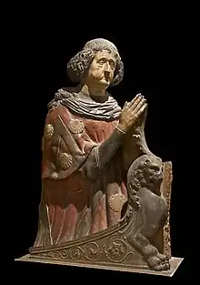 Sculpture polychrome en buste, mains jointes.