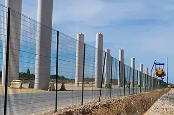 Tronçon entre la station Marguerite Perey et la future station Moulon Campus longeant la D128. Au loin, un lanceur.