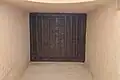 Plafond en bois à solives apparentes du porche de Bab al-Ma.