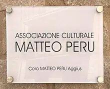 Photographie d'une plaque.