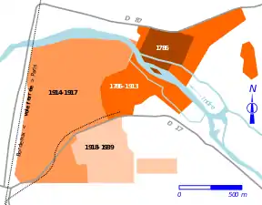 Carte en couleurs figurant les agrandissements successifs d'une usine.