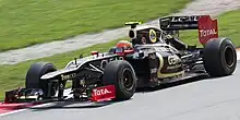 Grosjean pilote une Lotus F1 à Sepang en 2012.