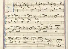 partition manuscrite rehaussée de couleurs passées