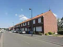 Habitations groupées par quatre.