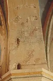 Premiers sondages archéologiques dans la couche d'enduit du XIXe siècle