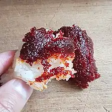 Avec du riz gluant mangé à la main