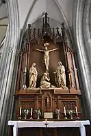 Retable dans un bas-côté de l'abbatiale