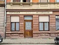 Au no 10, ancienne enseigne allemande (Vormals A. Hönnicke).