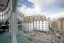 Surélévation en bois d'un foyer de migrants,