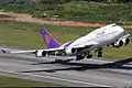 Thai Airways International Boeing 747-400 taking off Phuket International Airport.jpg