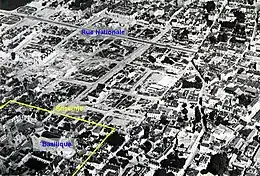 Tracé d'une enceinte urbaine reporté sur une photo aérienne.