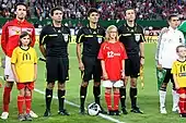 Trio arbitral dirigé par Massimo Busacca au football lors des qualificatifs pour l'Euro 2012.