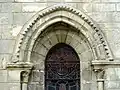 Croisillon nord, archivolte de la fenêtre.