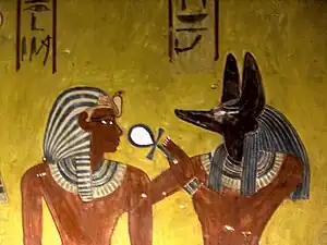 Anubis donnant le souffle de vieà Thoutmôsis IV - KV43 Vallée des Rois.