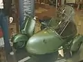 Vespa avec un side-car.