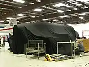 Enterprise en construction et sous les bâches en 2008