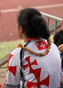 Une sportive arbore un t-shirt aux couleurs de Wallis lors d'un tournoi international de rugby, au stade de Kafika (août 2019).