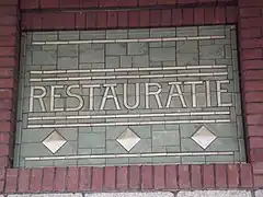 Écriteau de l'ancien restaurant.