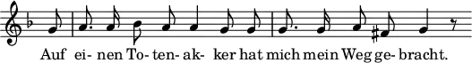 \header {
  tagline = ##f
}
\score {
  \new Staff \with {
    \remove "Time_signature_engraver"
  }
<<
  \relative c'' {
    \key f \major
    \time 4/4
    \set Score.currentBarNumber = #5
    \override TupletBracket #'bracket-visibility = ##f
    \autoBeamOff
     %%%%%%%%%%%%%%%%%%%%%%%%%% no 21 Das Wirtshaus
     \partial 8 g8 | a8. a16 bes8 a a4 g8 g | g8. g16 a8 fis8 g4 r8
  }
  \addlyrics {
     Auf ei- nen To- ten- ak- ker hat mich mein Weg ge- bracht.
  }
>>
  \layout {
    \context {
      \remove "Metronome_mark_engraver"
    }
  }
  \midi {}
}